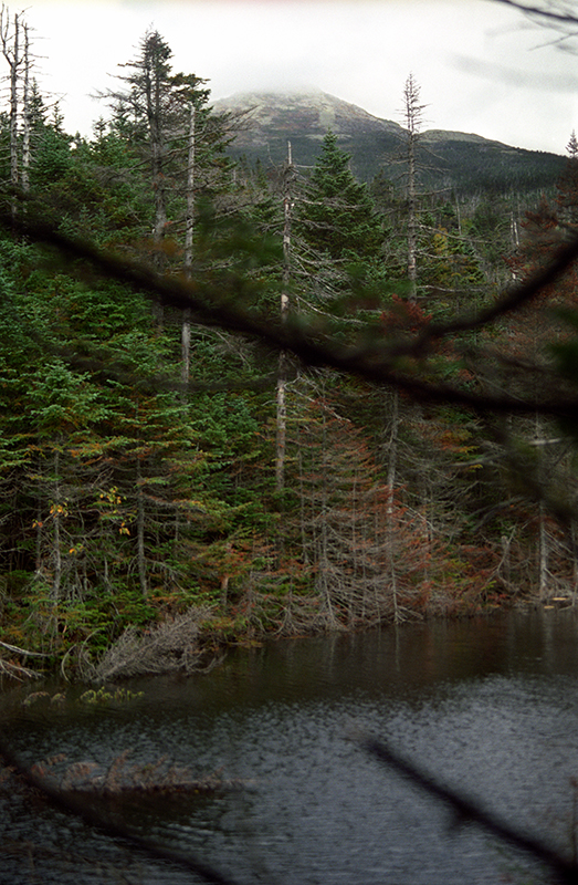 Mount Marcy disappears into the clouds above Lake Tear of the Clouds